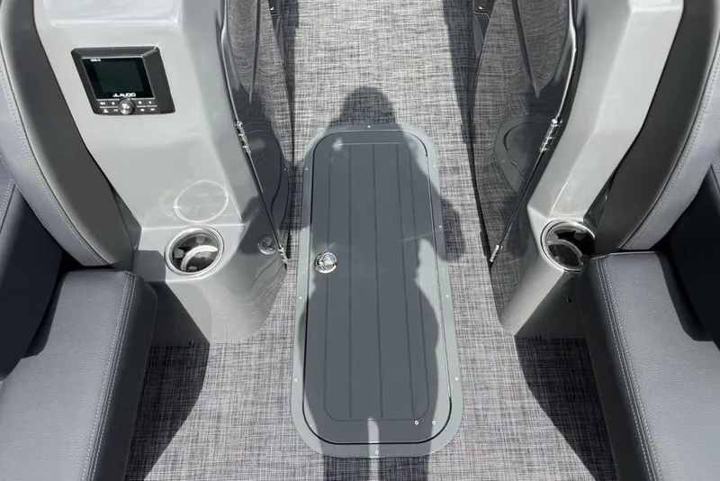 Slide: The Image of Interior of 2026 Godfrey Sanpan 2700 ULW Twin with cup holders and control panel. - 52