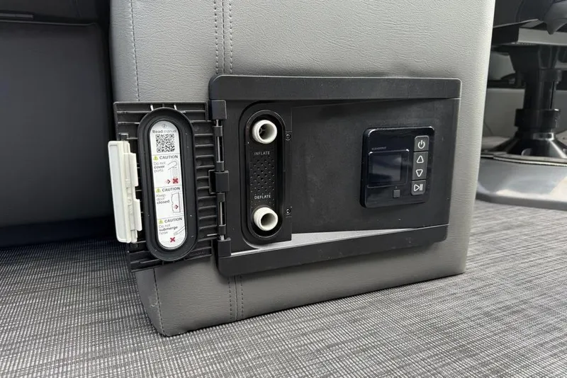 Slide: The Image of Control panel on a 2026 Godfrey Sanpan 2700 ULW Twin boat seat. - 53