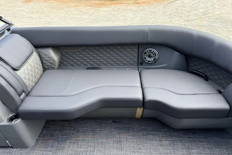 Slide: The Image of Luxurious seating on 2026 Godfrey Sanpan 2700 ULW Twin pontoon boat, featuring quilted upholstery. - 6