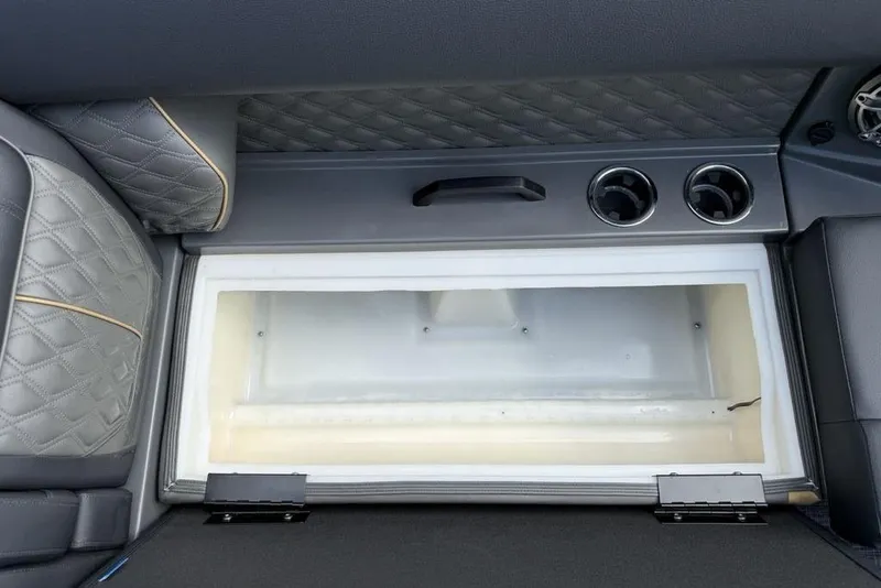 Slide: The Image of Interior of 2026 Godfrey Sanpan 2700 ULW Twin with storage compartment and cup holders. - 7