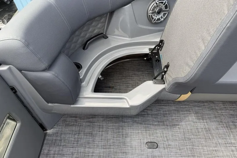 Slide: The Image of Interior of 2026 Godfrey Sanpan 2700 ULW Twin with gray seating and speaker detail. - 9