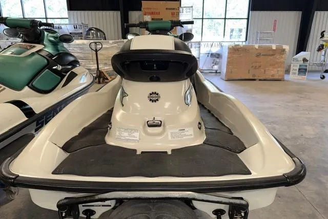 Slide: The Image of 2001 Sea-Doo GTX jet ski in a showroom, rear view. - 8