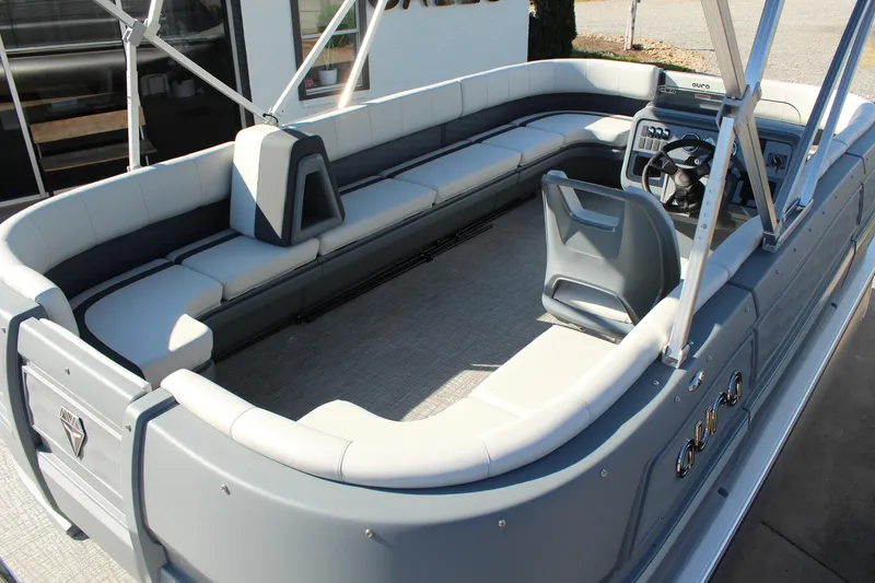 Slide: The Image of 2026 Tahoe Pontoon Aura boat interior with spacious seating and modern helm design. - 18