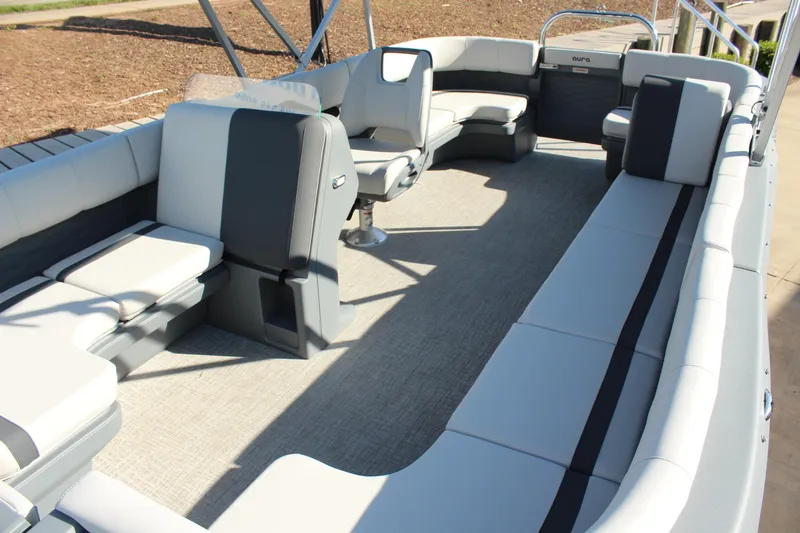 Slide: The Image of 2026 Tahoe Pontoon Aura interior with spacious seating and modern design. - 8