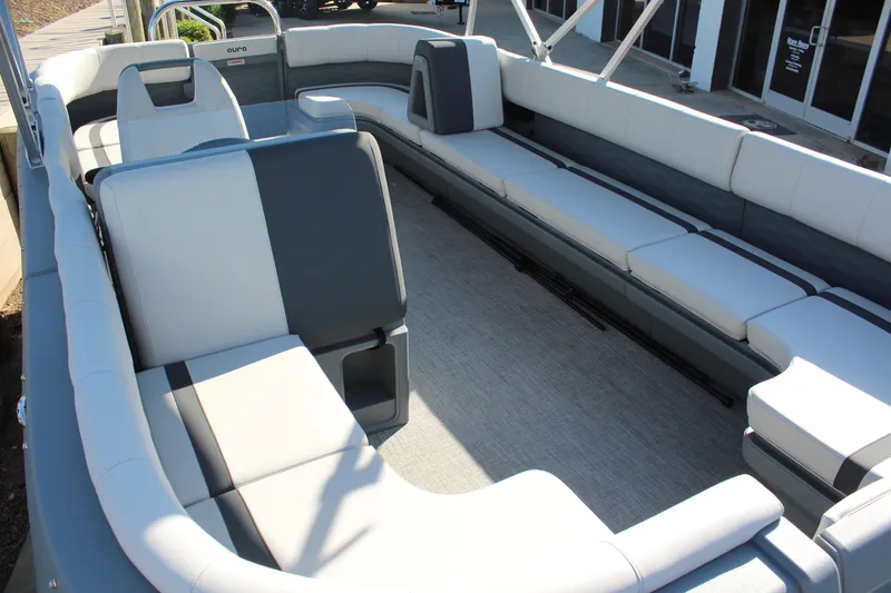 Slide: The Image of 2026 Tahoe Pontoon Aura interior with spacious seating and modern design. - 9