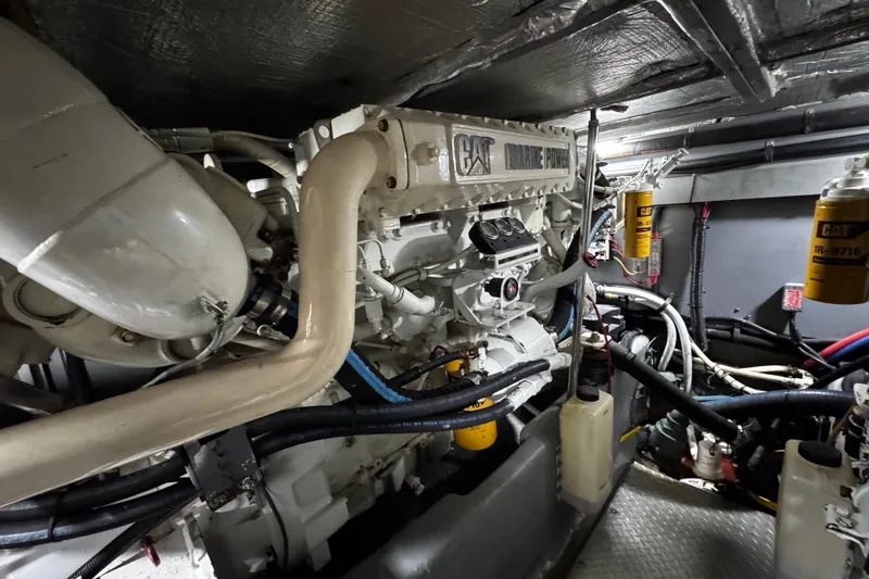 Slide: The Image of Engine room of 1999 Sea Ray 480 Sedan Bridge with CAT marine power engine. - 36