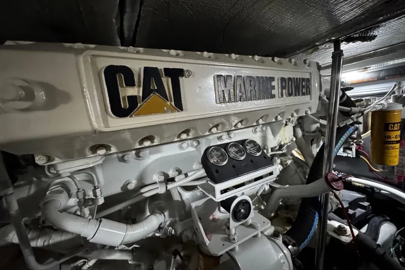 Slide: The Image of CAT Marine Power engine in a 1999 Sea Ray 480 Sedan Bridge yacht. - 39