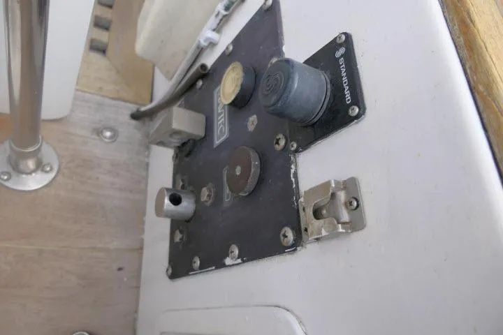 Slide: The Image of Control panel on 1986 Tayana 52 Center Cockpit sailboat, featuring various switches and connectors. - 44