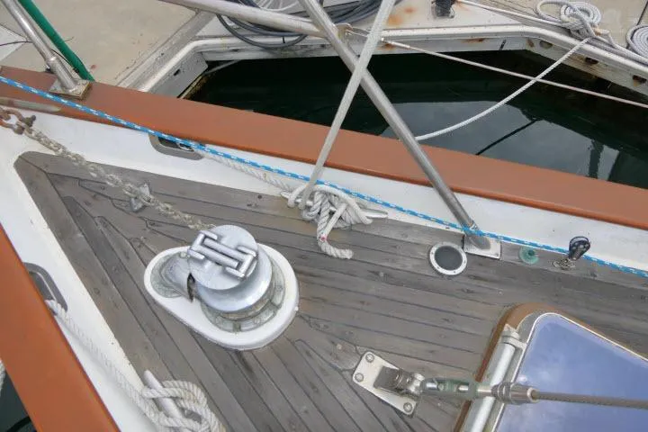 Slide: The Image of Deck of 1986 Tayana 52 Center Cockpit sailboat with winch and ropes. - 56