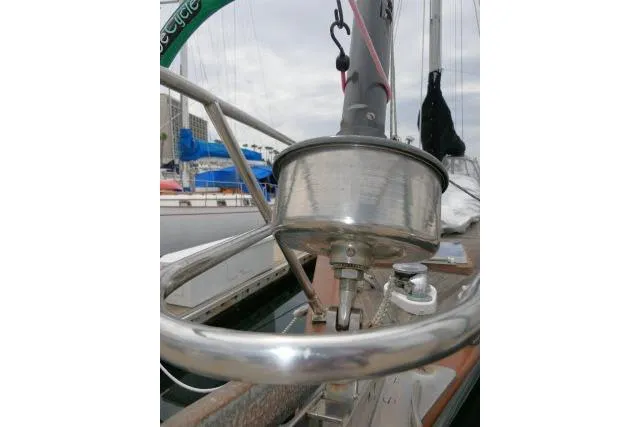 Slide: The Image of 1986 Tayana 52 Center Cockpit sailboat deck with stainless steel fittings and rigging. - 58