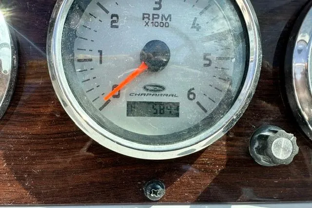 Slide: The Image of Close-up of 2006 Chaparral 236 SSi tachometer displaying RPM and engine hours. - 21