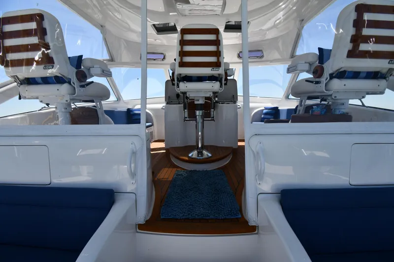 Slide: The Image of Interior view of 2012 Viking 42 Open yacht with seating and helm chairs. - 17