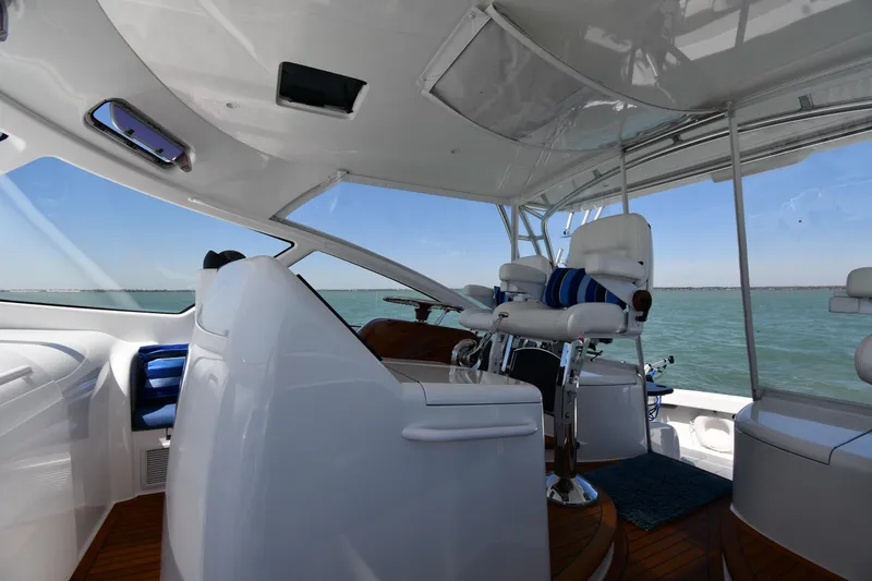 Slide: The Image of Interior view of 2012 Viking 42 Open yacht with ocean backdrop. - 21