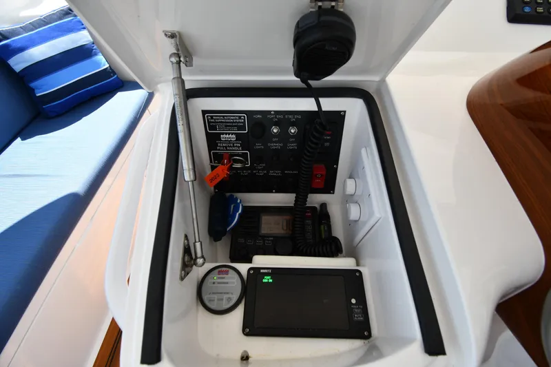 Slide: The Image of Control panel of a 2012 Viking 42 Open yacht with communication equipment. - 27