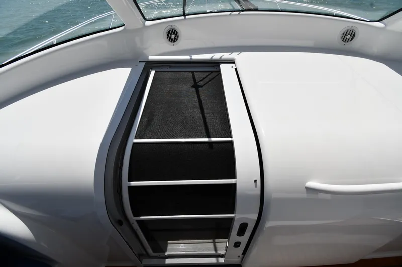 Slide: The Image of 2012 Viking 42 Open yacht deck with sliding hatch and ocean view. - 30