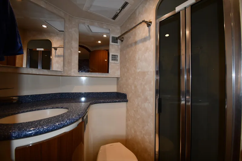 Slide: The Image of Luxurious bathroom interior of 2012 Viking 42 Open yacht with modern fixtures and elegant design. - 40