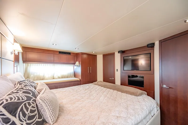 Slide: The Image of Luxurious bedroom interior of 2015 Regal 53 Sport Coupe yacht with modern amenities. - 18