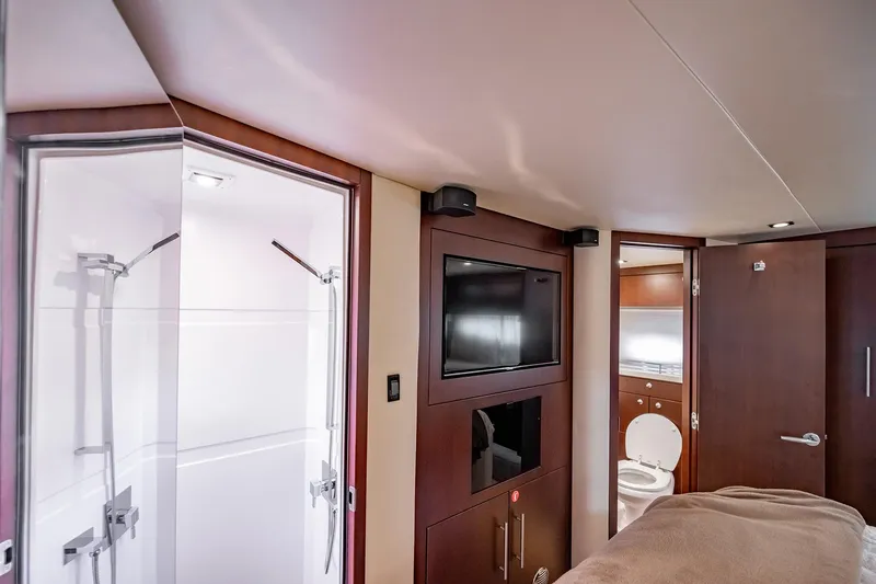 Slide: The Image of Luxurious interior of 2015 Regal 53 Sport Coupe yacht with modern amenities. - 20