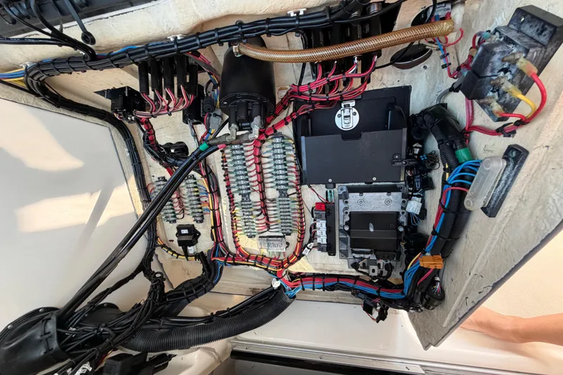 Slide: The Image of Electrical wiring system inside a 2009 Pursuit OS 315 Offshore boat. - 41