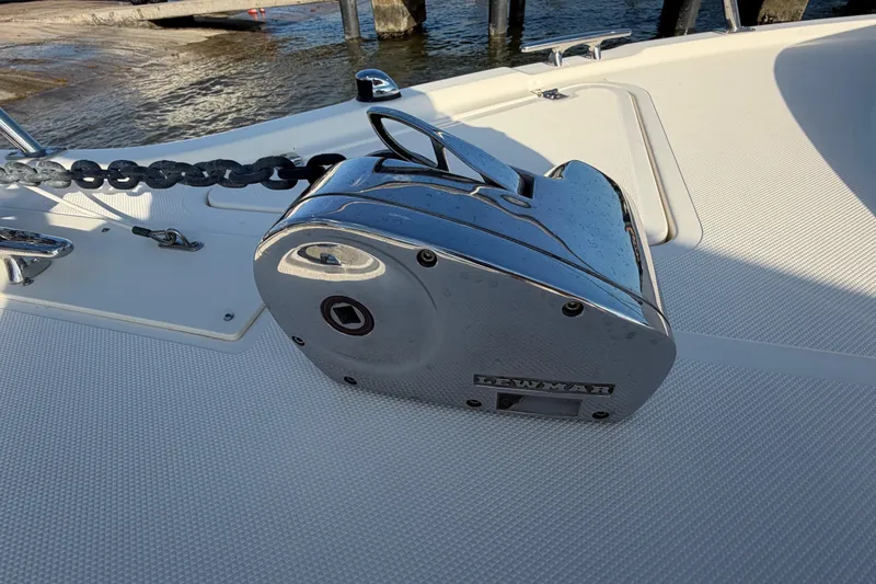 Slide: The Image of Chrome anchor windlass on 2009 Pursuit OS 315 Offshore boat deck. - 47