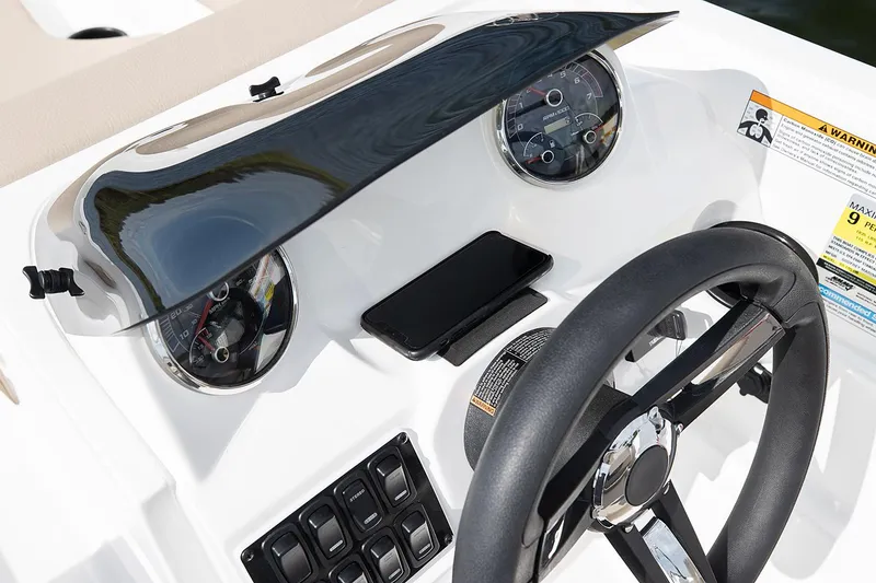Slide: The Image of Manufacturer Provided Image: 2022 Hurricane SunDeck Sport 185 OB dashboard with steering wheel and instrument panel. - 6