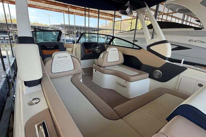 Slide: The Image of 2026 Chris-Craft Sportster 28 boat interior with luxurious seating and modern design. - 14
