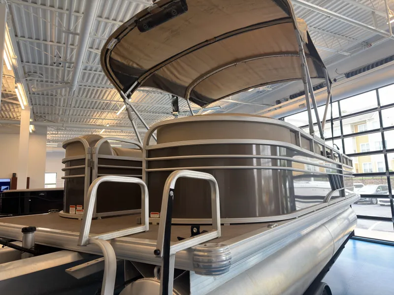 Slide: The Image of 2020 Tracker 22DLX pontoon boat in showroom. - 45