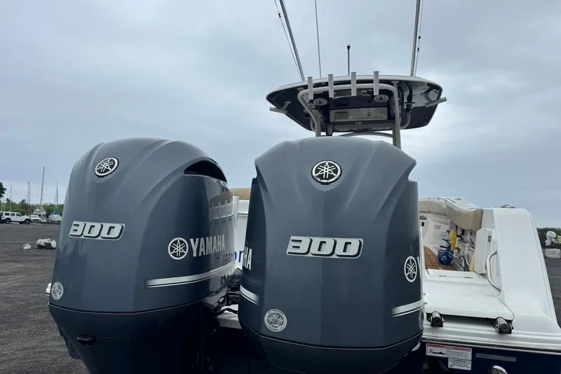 Slide: The Image of 2017 Sportsman Open 312 Center Console with twin Yamaha 300 engines. - 10