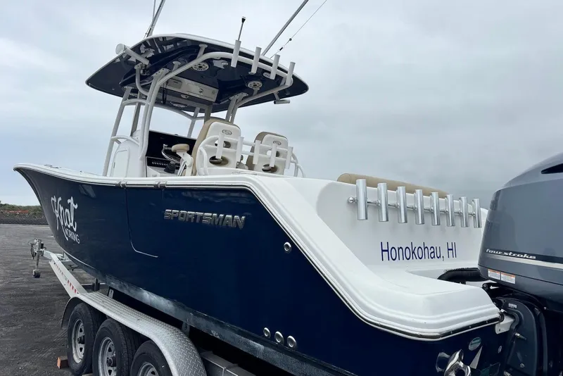 Slide: The Image of 2017 Sportsman Open 312 Center Console boat on trailer, Honokohau, HI. - 11