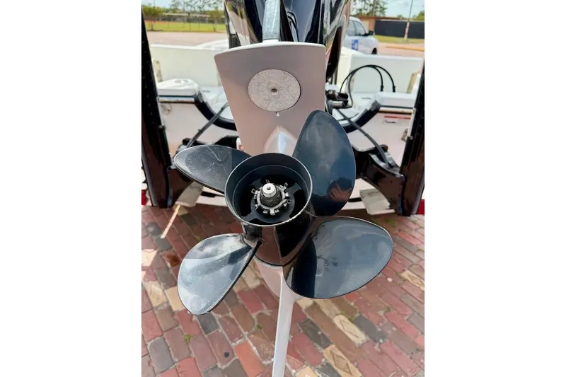Slide: The Image of Propeller of a 2022 Blazer Bay 2200 boat on a brick surface. - 13