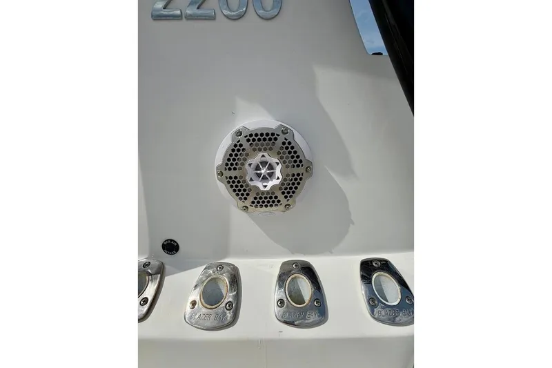 Slide: The Image of 2022 Blazer Bay 2200 boat detail with speaker and metal fittings. - 19
