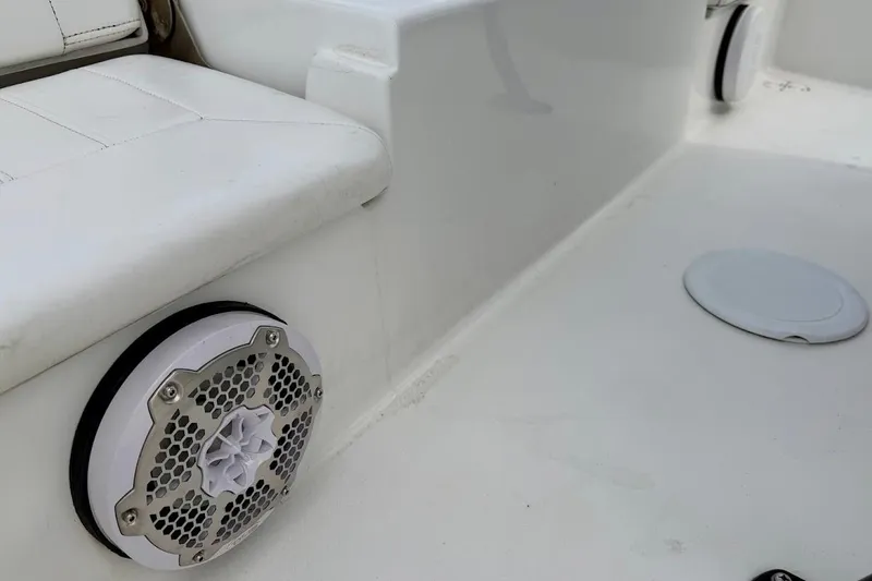 Slide: The Image of 2022 Blazer Bay 2200 boat interior with speaker and seating detail. - 23