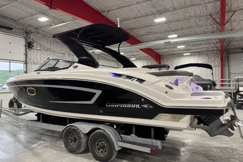 Slide: The Image of 2014 Chaparral 277 SSX boat on trailer in indoor storage facility. - 3