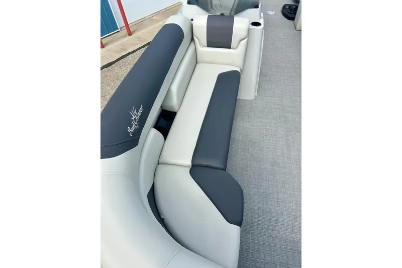 Slide: The Image of 2023 Sun Chaser Geneva boat interior with gray and white seating. - 25