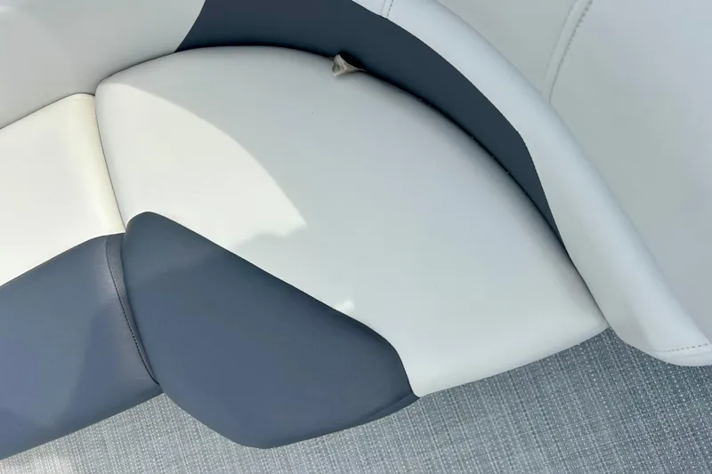 Slide: The Image of 2023 Sun Chaser Geneva boat seat with gray and white upholstery. - 27