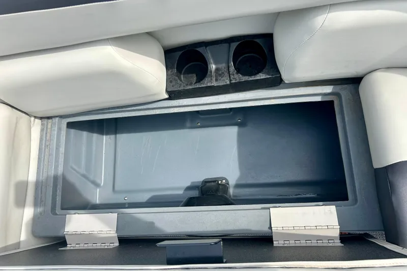 Slide: The Image of Storage compartment with cup holders in 2023 Sun Chaser Geneva boat. - 30