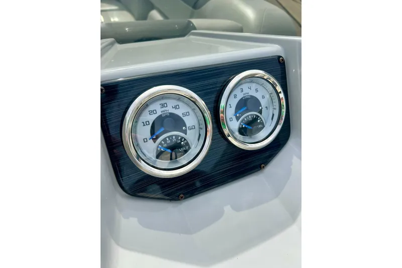 Slide: The Image of Dashboard gauges of 2023 Sun Chaser Geneva boat, displaying speed and RPM. - 35