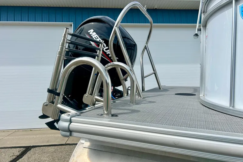 Slide: The Image of 2023 Sun Chaser Geneva boat with Mercury engine and stainless steel ladder on deck. - 7