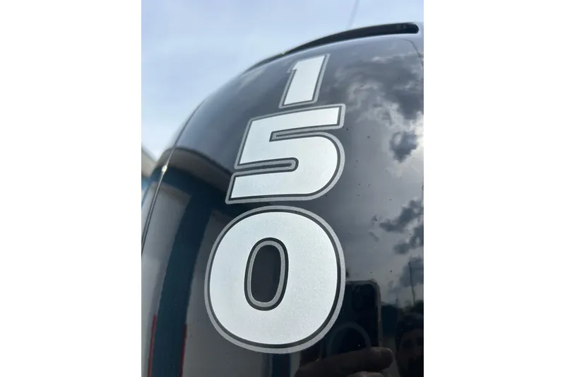 Slide: The Image of Close-up of '150' decal on 2023 Sun Chaser Geneva boat exterior. - 9