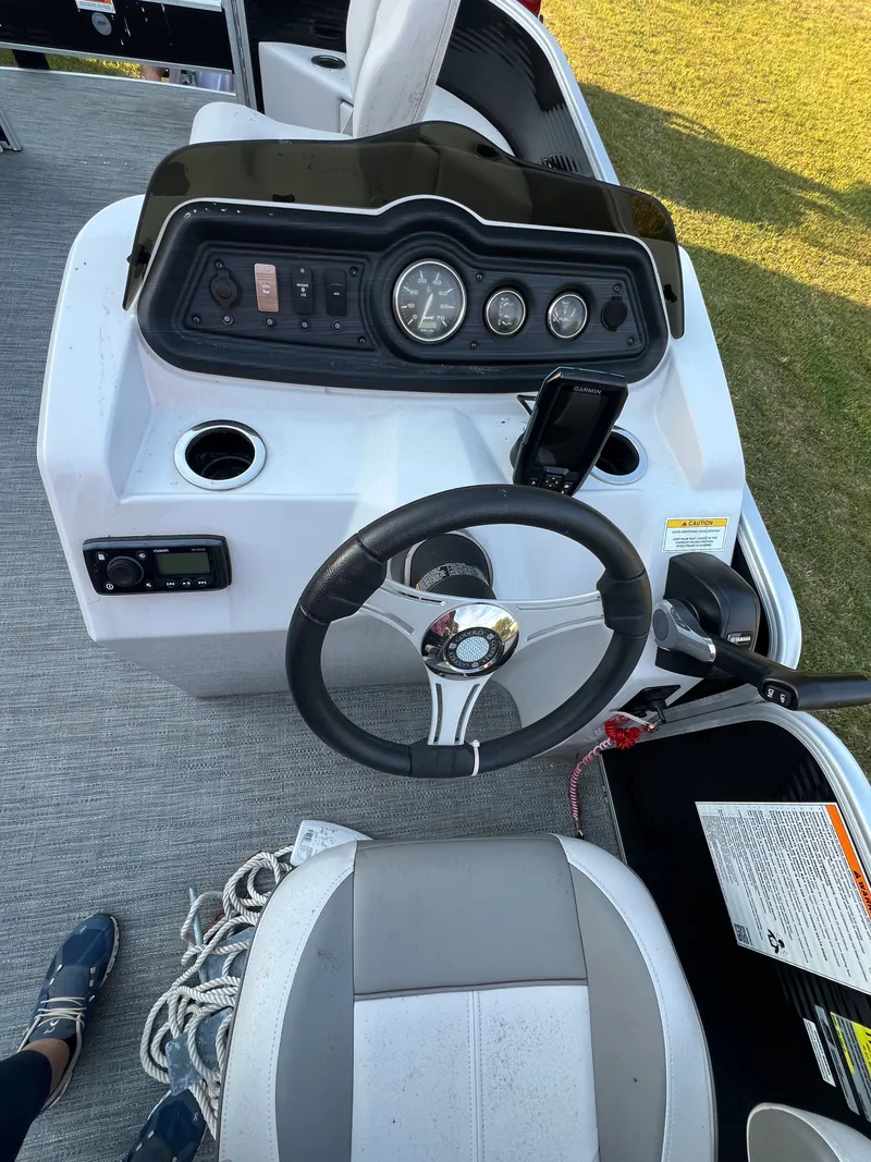 Slide: The Image of Dashboard of a 2020 Godfrey Sweetwater 208 pontoon boat. - 7