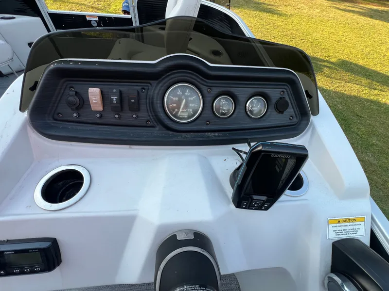 Slide: The Image of Dashboard of a 2020 Godfrey Sweetwater 208 boat. - 8