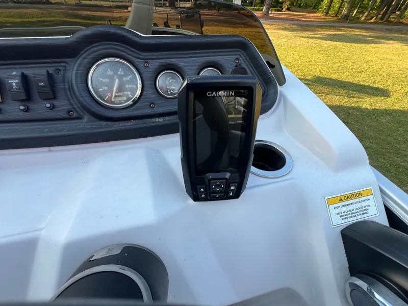 Slide: The Image of Dashboard of a 2020 Godfrey Sweetwater 208 boat with Garmin device. - 9