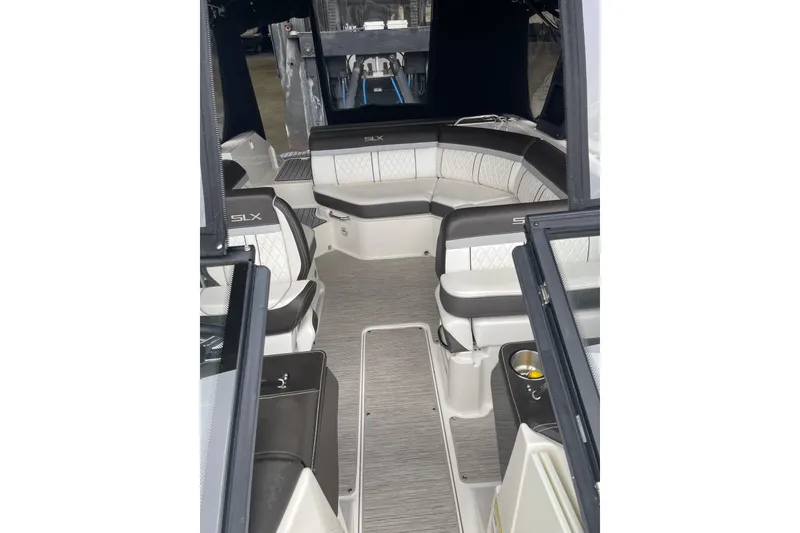 Slide: The Image of Interior view of 2016 Sea Ray SLX 230 boat, featuring luxurious seating and modern design. - 14