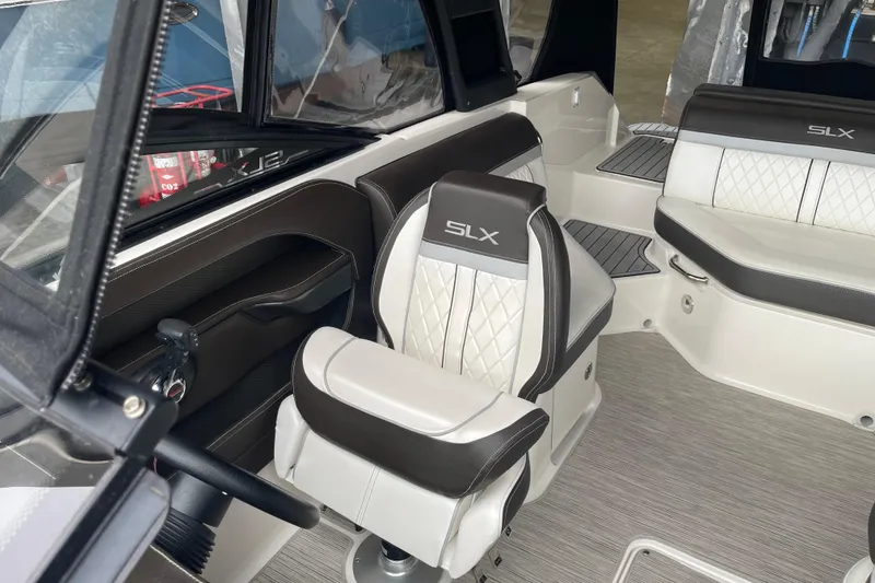 Slide: The Image of 2016 Sea Ray SLX 230 boat interior with luxurious seating and modern design. - 15