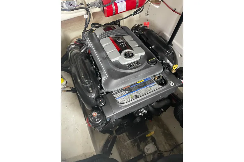 Slide: The Image of Engine of a 2016 Sea Ray SLX 230 boat, featuring a 4.5L 250 horsepower motor. - 18