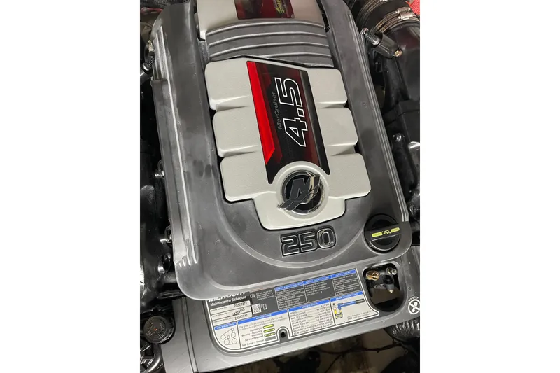 Slide: The Image of Engine of a 2016 Sea Ray SLX 230 boat, featuring a 4.5L MerCruiser 250. - 19
