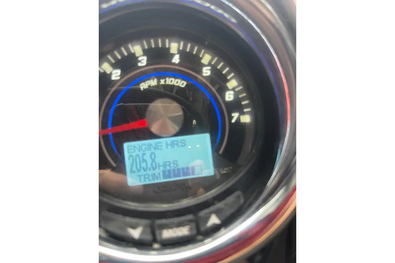 Slide: The Image of Close-up of 2016 Sea Ray SLX 230 tachometer showing 205.8 engine hours. - 23