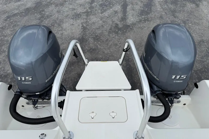 Slide: The Image of 2020 World Cat 230 DC boat with dual Yamaha 115 outboard engines. - 17