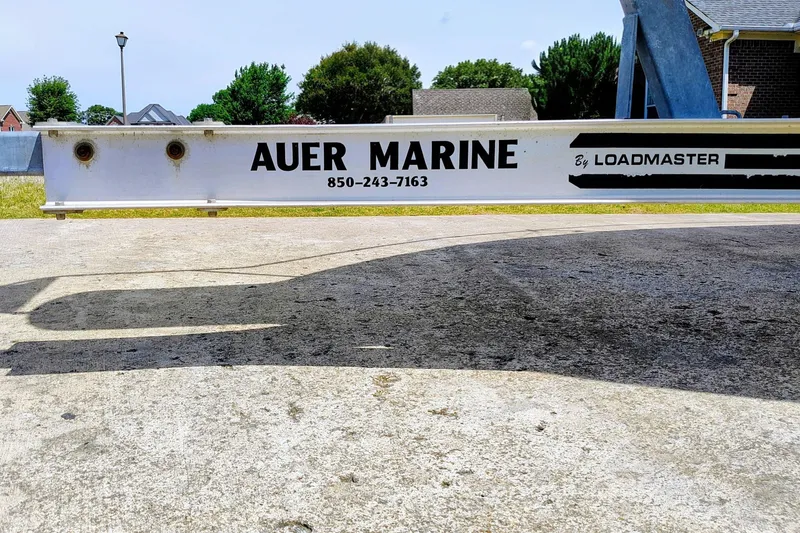 Slide: The Image of Trailer for 2001 Glastron GS 249 by Auer Marine, Loadmaster branding visible. - 43