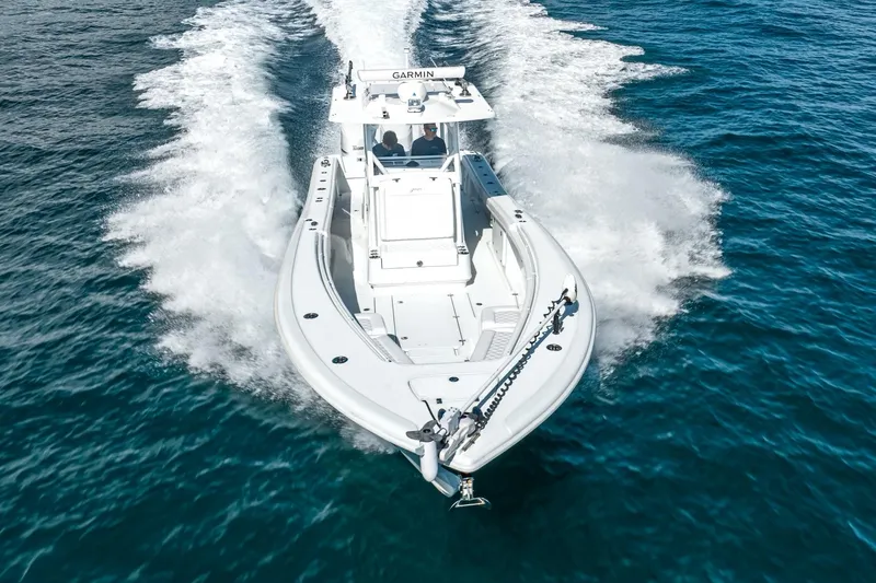 Slide: The Image of 2020 Yellowfin 36 Offshore boat cruising on the sea. - 12